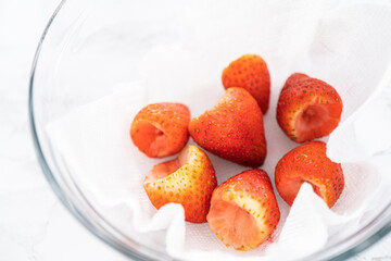 Washed and Dried Strawberries Neatly Stored in a Glass Bowl