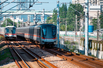 A subway train running on ground tracks in Shanghai, China.