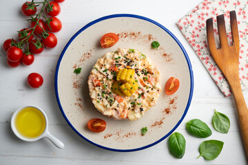 Russian salad with potato, corn and mayonnaise. Top view table with  decoration.
