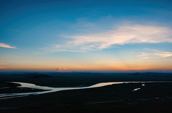 Western China, river on the Zoige Grassland at dusk