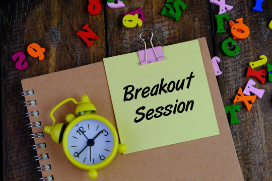 Top view Breakout Session wording with yellow clock. Business education concept 