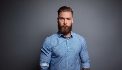 Obraz premium Hipster businessman in blue shirt, studio shot, gray background