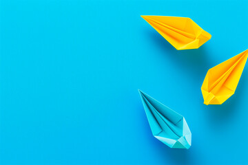 An AI generative image of top view blue and yellow origami paper boat on blue background
