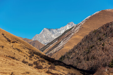 Mountain scenery of the eastern Qinghai-Tibet Plateau under the blue sky