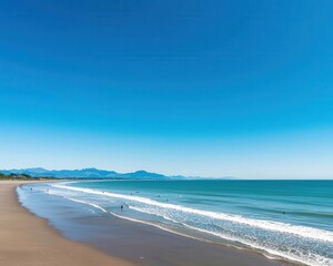 Obraz premium A sunny day at New Brighton Beach, with surfers catching waves and families enjoying the scenic Christchurch coastline