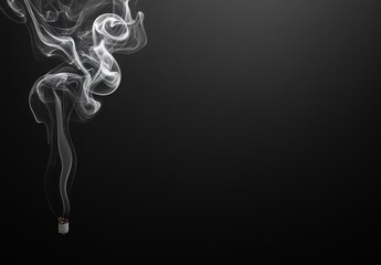 white smoke rising from the tip of an incense stick