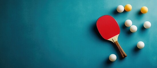 Ping Pong Paddle and Balls on a Teal Background