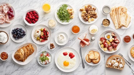 A variety of traditional breakfast foods arranged on a marble surface, creating a classic and elegant setting.