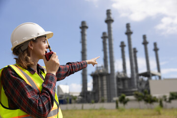 Senior female Electrical Engineers working to  check up on the progress of the project  and talk on...