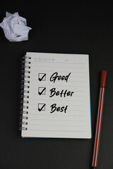 text of good, better and best on notebook