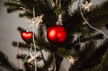 closeup of ornaments on christmas tree. copy space banner