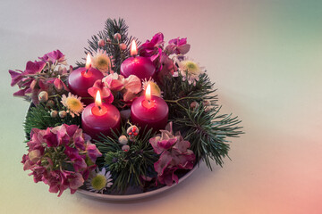 advent wreath with four red candles, 4 candles burning, purple tone