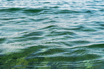 Obraz premium Water blue sea. Lake wave surface. Ocean texture abstract. Waves ripple reflection sunset.