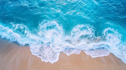 Obraz premium Aerial view of beautiful tropical beach with turquoise ocean wave