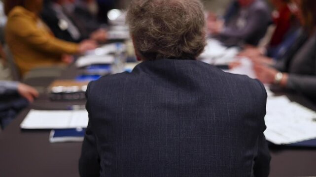Board of directors in meeting room, Company executive director and management at the table, global corporation boss, parters team and investors, CEO back view, discussing project and planning strategy