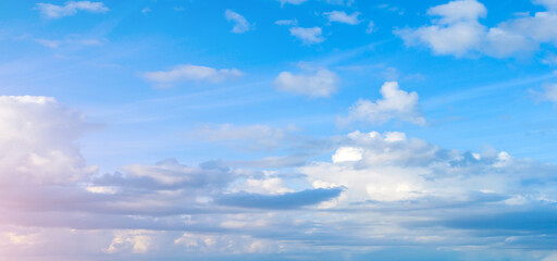 Sunset sky background, panoramic view of colorful sunset sky. Vast sunset sky background in soft tones