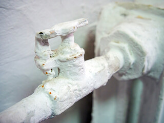 Radiator shut-off valve not working due to multiple layers of paint