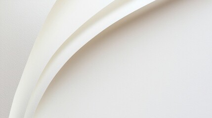 Obraz premium White paper sheet is creating an abstract minimalist background with soft shadows and curves. The texture of the paper is visible