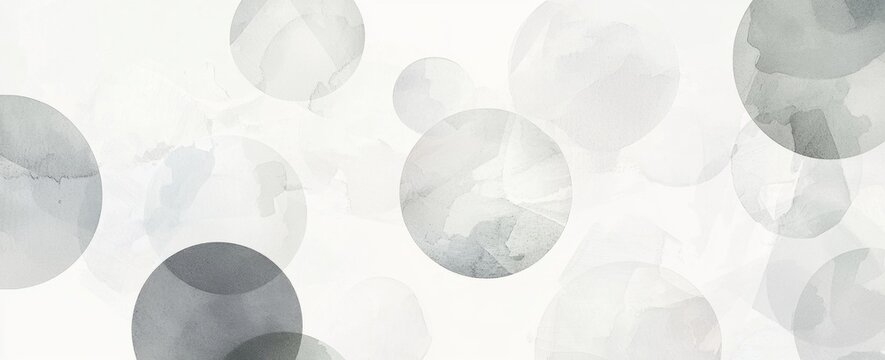 Captivating watercolor circles in shades of gray create depth and movement. Elegant and modern design adds luxury to projects. Serene and calming vibe ideal for spa visuals