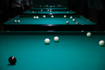 Sports game of billiards on a green cloth