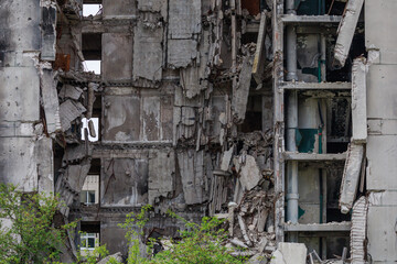 Residential building destroyed by military actions in Ukraine.