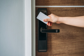 Electronic card key for open door in hotel. Smart card key to lock and unlock door. Security...