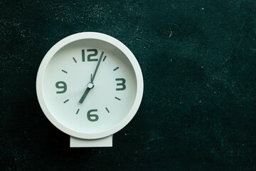 Alarm clock on black background, concept