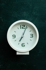 Alarm clock on black background, concept