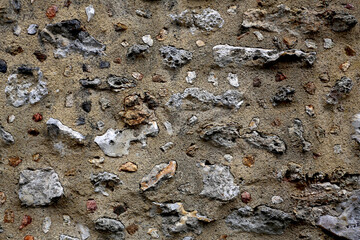 Mur de pierres maçonnerie avec des silex