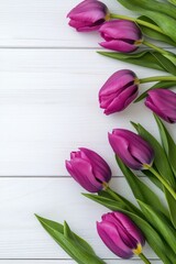 Fresh purple tulips arranged beautifully on a rustic wooden table with natural light