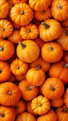 Autumnal harvest: Vibrant orange pumpkins piled high against a rustic backdrop