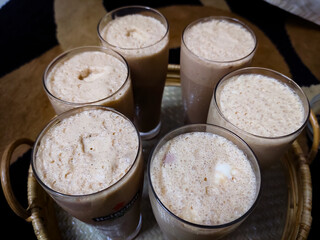 Some glasses are full of lacchi ready for serving