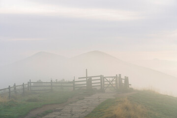 The Great Ridge with morning mist in Peak District. England