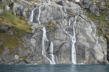 Waterfall Cascading into Prince Christian Sound, Greenland
