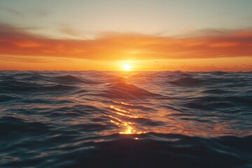 Obraz premium Serene Sunset Over Ocean Waves