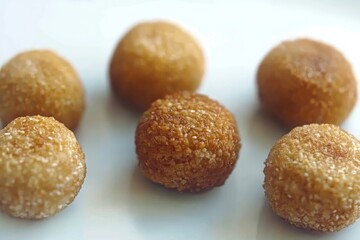 title: Indulge in Deliciously Crispy Sweet Sesame Balls - A Perfect Treat