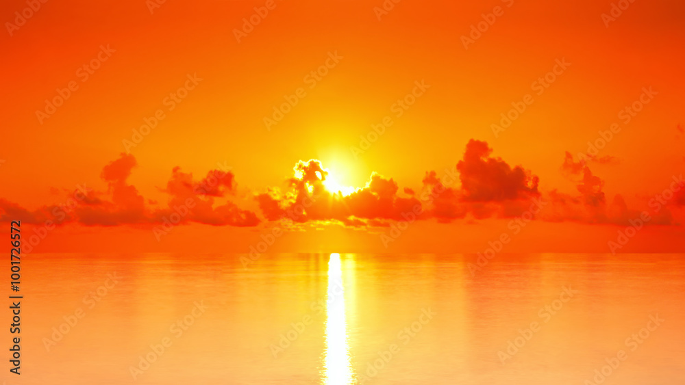 Poster sunset over sea, sun is setting over the ocean, casting a warm orange glow across the water. the sky