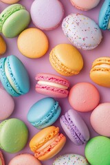 Obraz premium Colorful macarons in various flavors displayed beautifully on a light background
