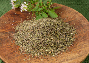 Dry thyme pile, dried marjoram, oregano heap, ground crushed thyme seasoning, thyme leaves
