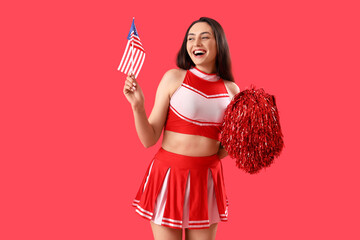 Female cheerleader with USA flag on red background