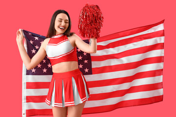 Female cheerleader with USA flag on red background