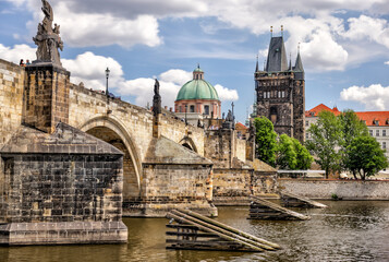 Prague, Czech Republic - July 19, 2024: Morning views along the Vltava River and Charles Bridge n Prague in the Czech Republic
