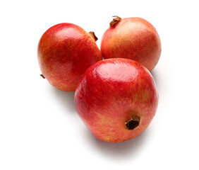 Fresh pomegranates on white background