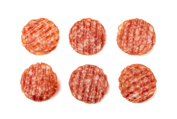 Salami chips isolated, wavy sausage slices, sliced dry chorizo, sausages thin pieces, pepperoni pizza ingredient
