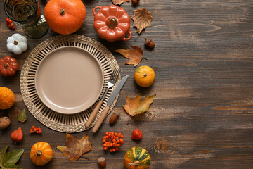 Beautiful table setting for Thanksgiving Day celebration on wooden background