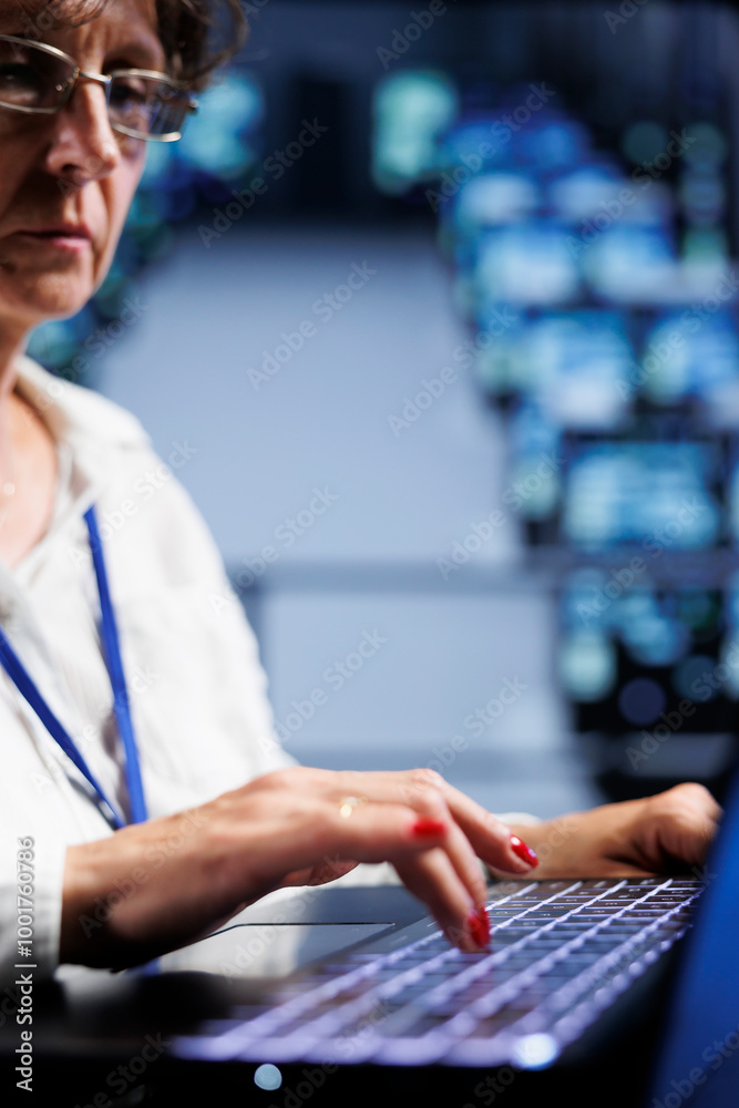 Poster skilled expert using laptop to make sure valuable data remains shielded from security issues, safegu