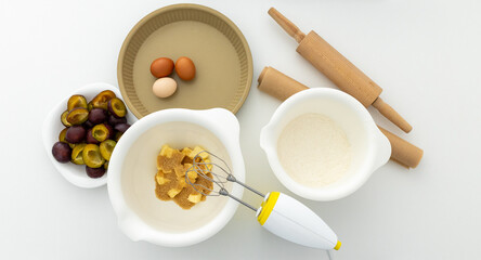 plum pie ingredients in plates, baking and cooking at home