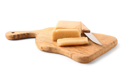 Wooden cutting board with marzipan bar and knife on white background