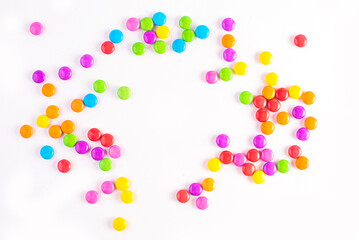 Gourmet chocolate candy assortment laid out on slate background