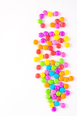 Gourmet chocolate candy assortment laid out on slate background